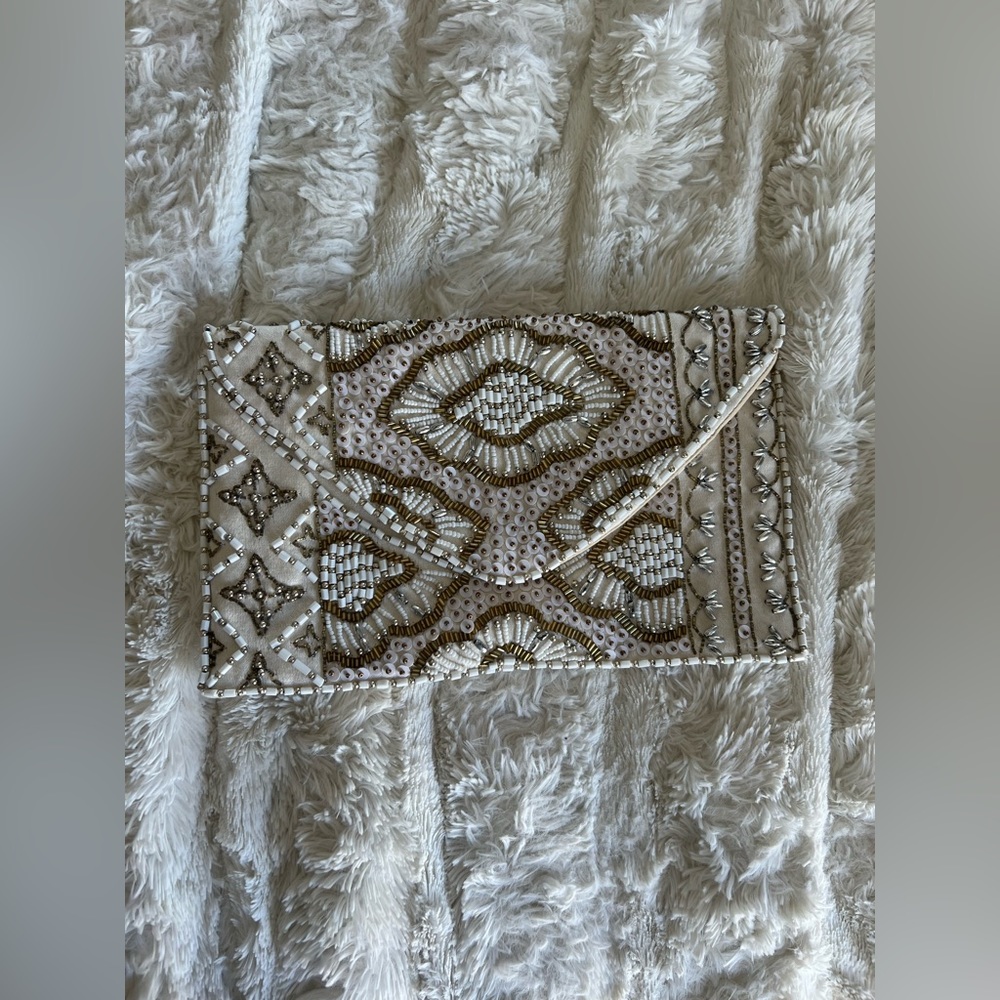 Hand beaded clutch